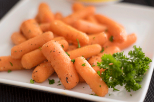 The kids will finally eat vegetables with our parmesan roasted garlic carrots.