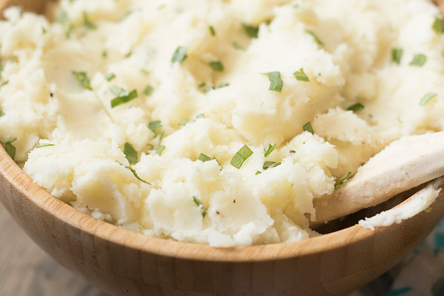 Add garlic butter to your Instant Pot mashed potatoes for a quick, delicious side dish.