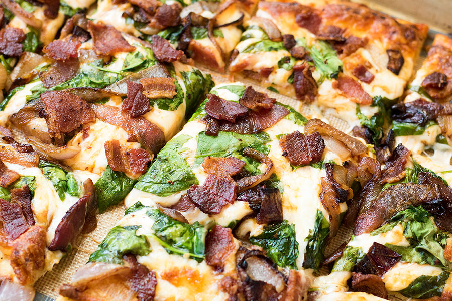 Caramelized Onion Spinach and Bacon Pizza